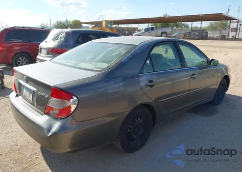 2003 Toyota Camry Le z USA, uszkodzony, nr VIN 4T1BE30K13U725595